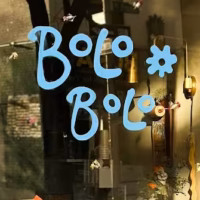 Bolo Bolo Cafe and Bakery logo